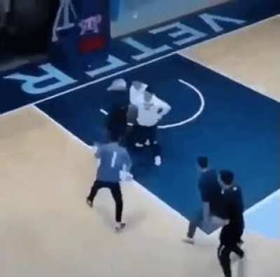 Dudes in a basketball court
