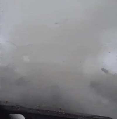 Driving next to a moving tornado