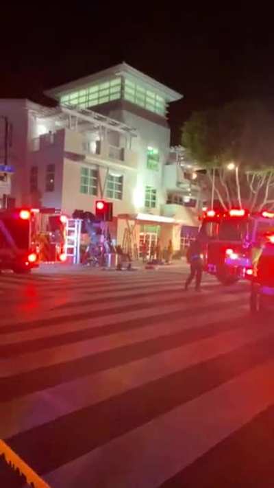 [OC] Idiot kid was drifting recklessly on top of the building, lost control and flew into the McDonald’s across the street. Lucky idiot because there were no injuries.