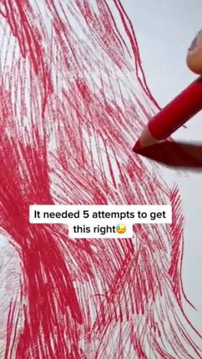 Pure talent it took her 5 attempts to finally make it. drawing two person at the same time in one picture.