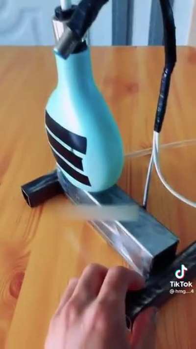 Automatic Squeezing Hand Sanitizer Aid ?