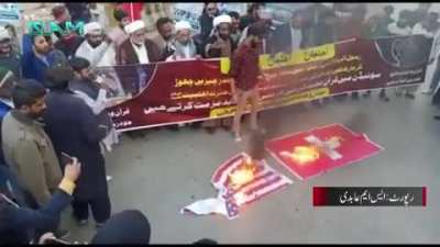 Pakistan: Swiss &amp; American flags burned for Quran burning incident in Sweden