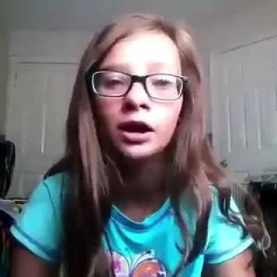 ~12 year old thinks she is a gangster. Caption of the video was "me rapping gang shit"