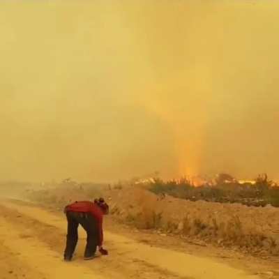 ? Fire tornado steals hose from firemen