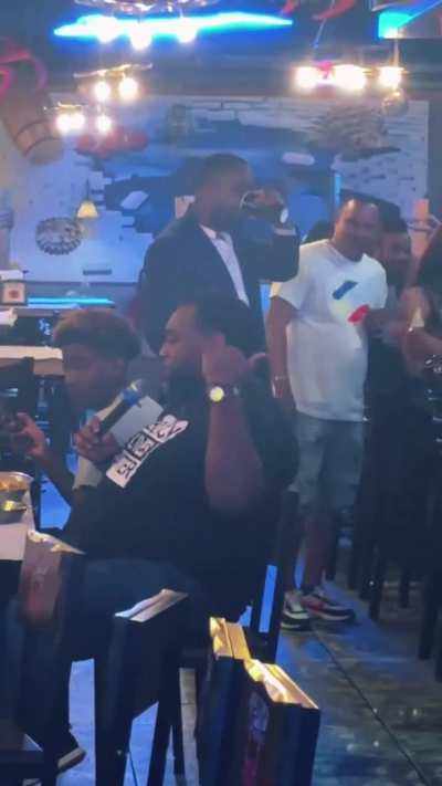 Guy at a karaoke bar in Atlanta nails Biggie and Ronald Isley's vocals while performing a mashup of the songs "Big Poppa" and "Between the Sheets.