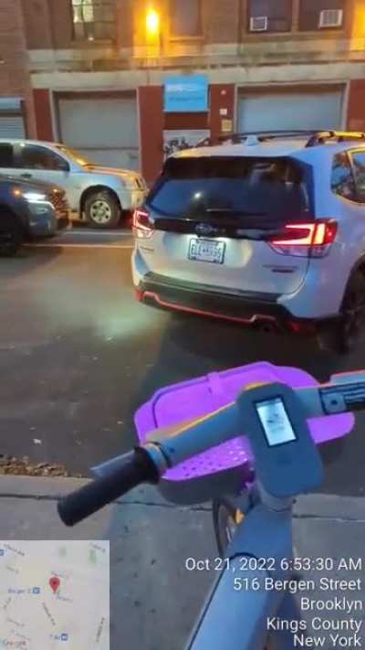 Cop demands cyclist move out of the way so he can illegally back his personal vehicle onto the sidewalk