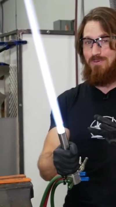 First retractable proto-lightsaber