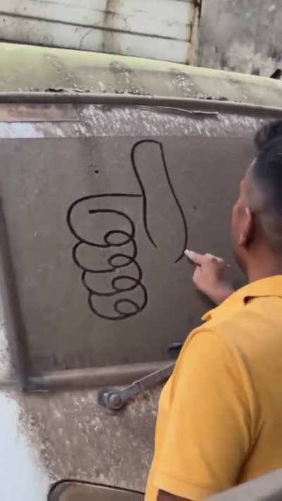 Thumbs Up on a dirty window