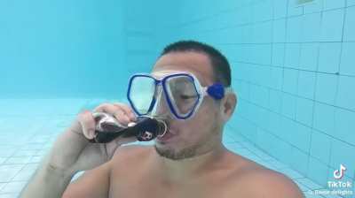 Chug RC cola then burp under water ??