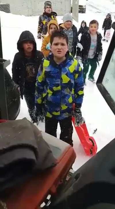 Kids ask the snowplow dude not to do it so that they can keep enjoying it. He doesn't disappoint.