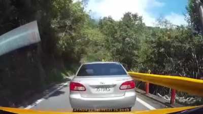Huge boulder barely misses car during earthquake in eastern Taiwan.
