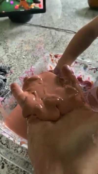 Non-Newtonian fluid that is solid under pressure but instantly turns liquid when not