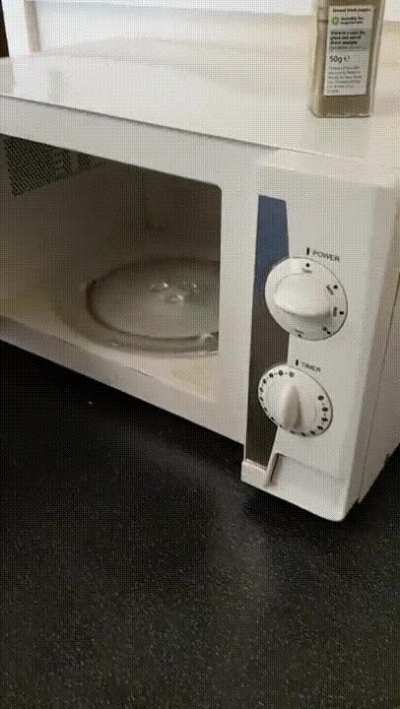 The button opens the door, so the door opens the button