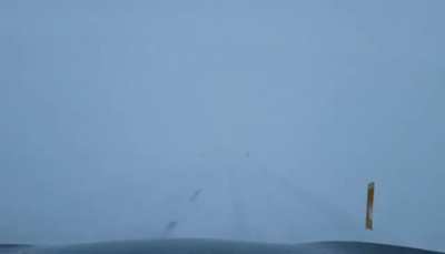 Driving in northeastern Iceland earlier today. It was like this for over an hour. Definitely a butt-hole puckering experience