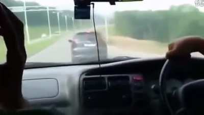 Guy driving like an idiot,tailgates a man who is driving with his wife and child. The idiot then passes and brake checks the family and corners them in with no escape leaving the dad no option but to protect his family. Idiot driver gets a lesson in "dad