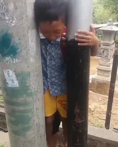 I wonder how he managed to stick his head in there.