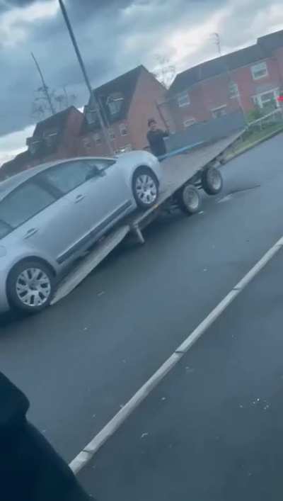 Loading a trailer with no clue.