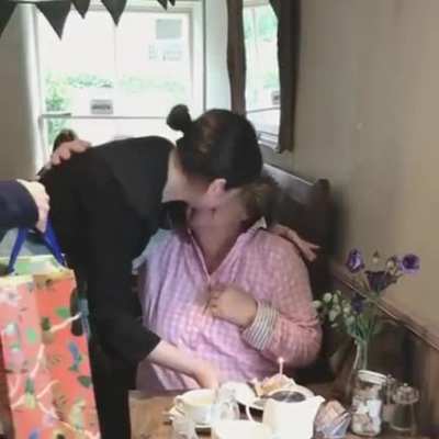 A regular customer's heartwarming reaction to a free cake on her birthday .
