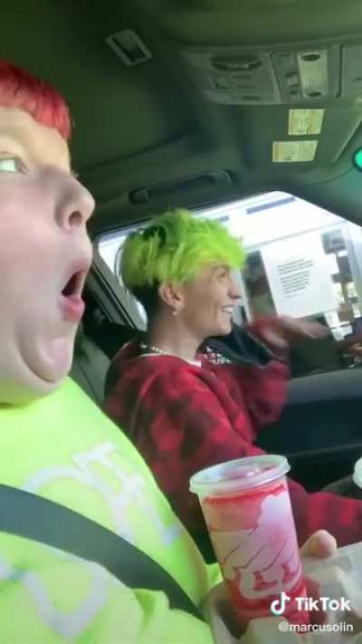 Telling his friend to go yet he's the one driving.