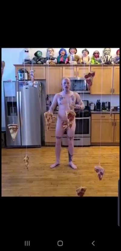 Near naked man &amp; floating pizza