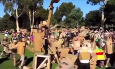Each year in an Australian park, hundreds of people bring their handmade cardboard creations to battle in a giant cardboard war known as "Box Wars.