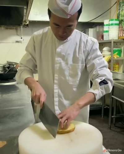 Slicing potato into a thin net