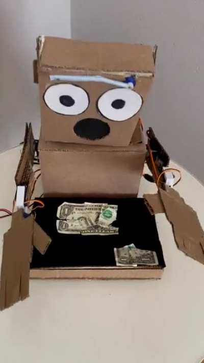 That Cardboard Robot Magician is back... with ??⁉️ by mariothemagician
