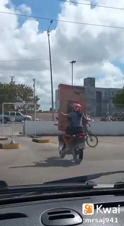 WCGW carrying your new TV in a scooter