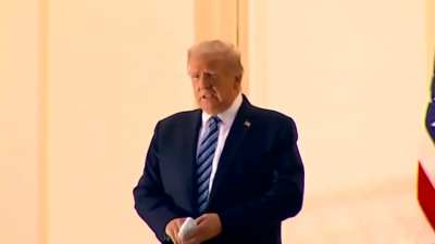 Trump with COVID having trouble breathing standing on White House balcony trying to project strength, after leaving Walter Reed prematurely