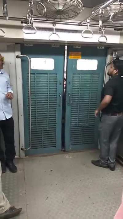Automatic doors go brrr. Spirit of Mumbai, India.