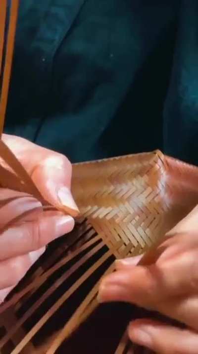 Making a briefcase out of a single bamboo stick.