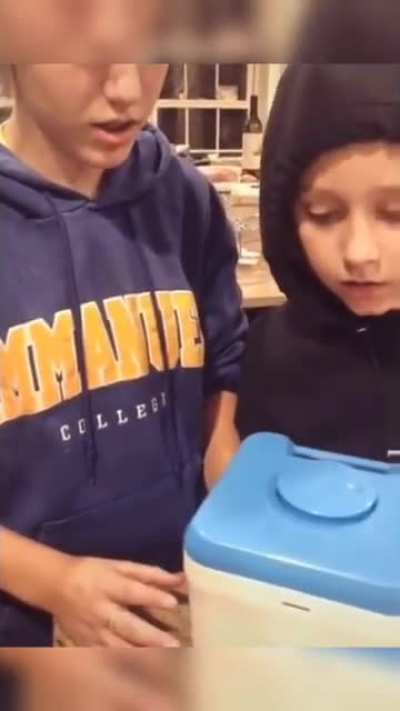 Girl tries to free her phone from a "phone jail"