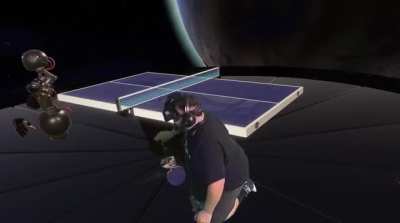 WCGW leaning on a ping-pong table in VR