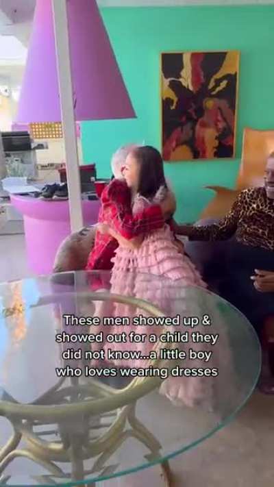 group of men wear dresses to give a kid the chance to feel comfortable dressing the way he feels best ?️‍? @themcleodfam