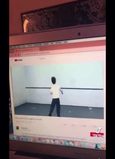 Tennis ball against the wall