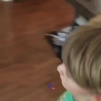 shoots 2 nerf guns. hits a double bullseye