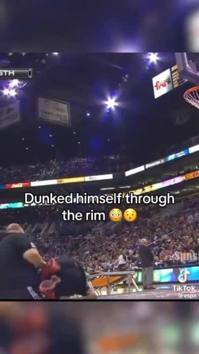 Damn! He dunked himself through the rim
