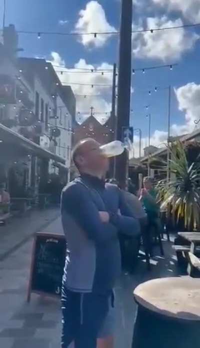 To down a pint with no hands
