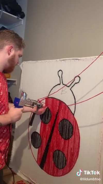 this guy making a carpet