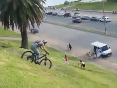 down a slope by bike
