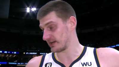 [Highlight] During his post-game interview, Nikola Jokic spots two fans making out in the crowd. "Look at them! They are kissing! They are enjoying life."