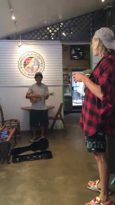 Guy playing "One Day" by Matisyahu in random Hawaiian coffee shop