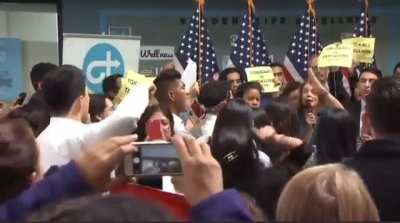 Latino-Americans yell at Nancy Pelosi