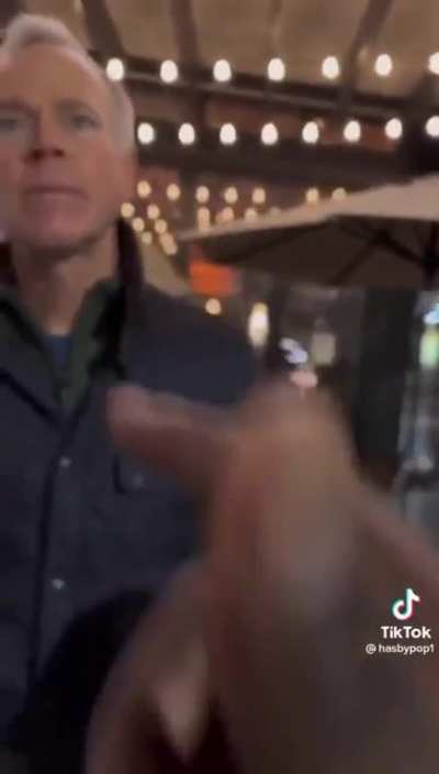 Group of guys try to bait a guy eating dinner