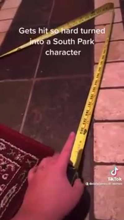 Messing with a measuring tape.