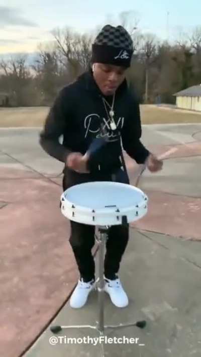 Drummer displaying his ridiculous skills