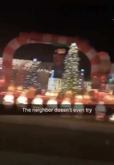Neighbors working together on their holiday displays is beautiful