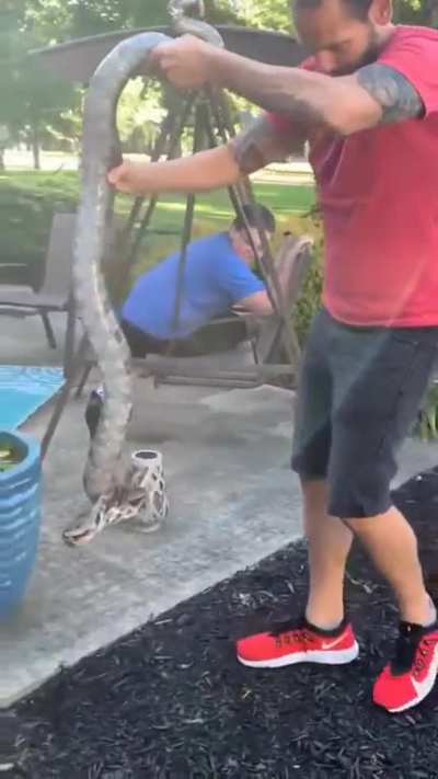 WCGW holding a snake