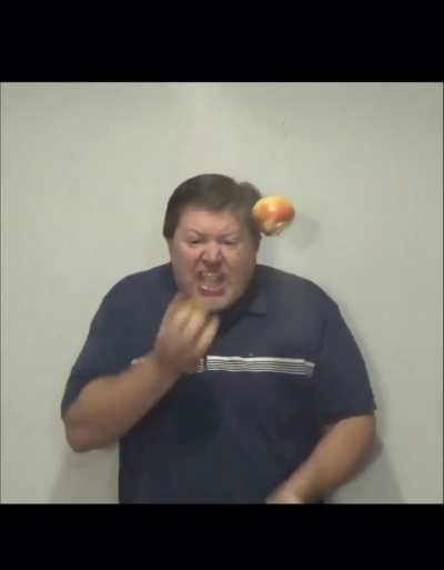 Buddy must really want "the apple"