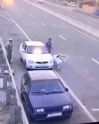 And this is why you check your rear view mirror and side mirror. Also why, when you pull over, pull over as far off the road. And turn your Hazzard lights on... But then proceeds to stand there with his back to oncoming traffic? Not sure he learnt the les